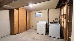 Laundry area featuring independent washer and dryer