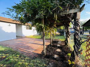 View of yard with a patio