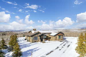 View of side of home with stone siding