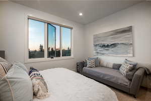 Bedroom featuring carpet and recessed lighting