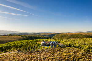 View of subject property featuring a mountain backdrop