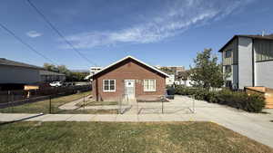 View of side of property with brick siding