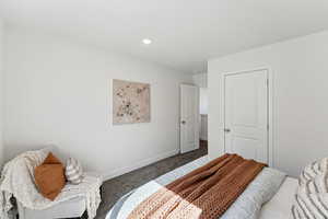 Bedroom featuring carpet and recessed lighting