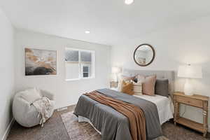 Bedroom with carpet flooring and recessed lighting
