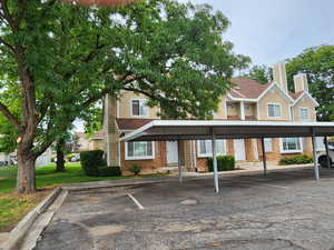 View of partially covered parking lot