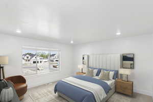 Primary  bedroom with baseboards and recessed lighting