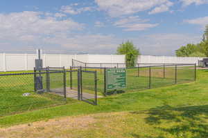 View of community featuring a dog friendly area