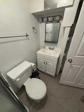 Bathroom with vanity and toilet