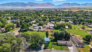 Aerial view of residential area featuring mountains