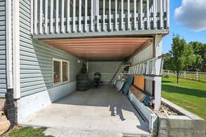 Patio / terrace featuring a patio area and a carport