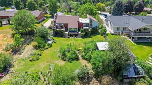 Aerial view of residential area with a tree filled landscape