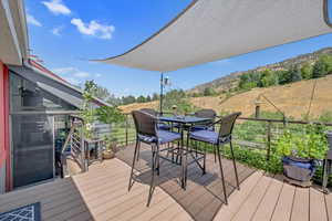 Wooden deck with outdoor dining space