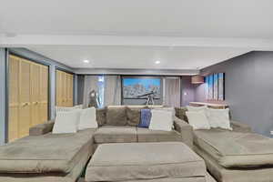 Home theater room featuring recessed lighting