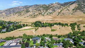 Aerial view of residential area featuring mountains