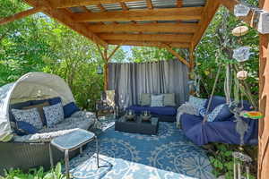 View of patio with outdoor lounge area