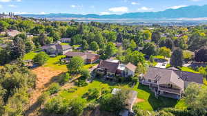 Aerial view of residential area featuring a mountain backdrop