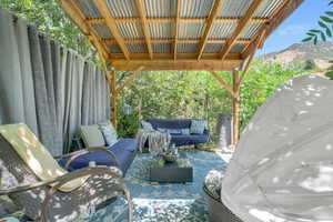 View of patio with outdoor lounge area