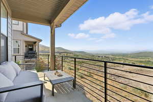 Balcony featuring a mountain view