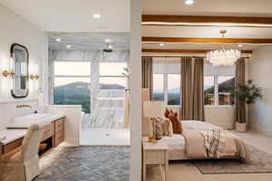 Bedroom with recessed lighting, beamed ceiling, and a chandelier