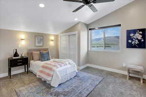 Bedroom featuring recessed lighting, light carpet, vaulted ceiling, a closet, and ceiling fan