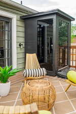 View of patio with an outbuilding