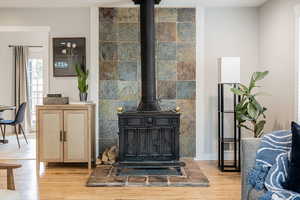 Detailed view of a wood stove and wood finished floors