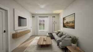 Living room featuring light wood-style flooring and recessed lighting