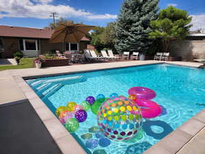 View of pool featuring a patio