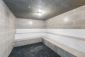 Sauna with tile patterned flooring
