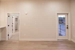Empty room featuring light wood-type flooring