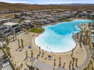 Community pool featuring a residential view and a mountain view