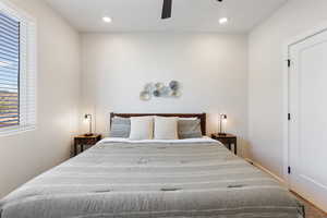 Bedroom with recessed lighting and ceiling fan