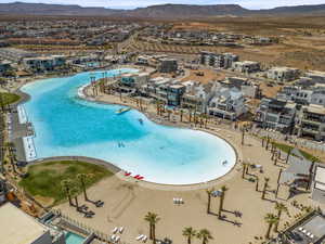 Aerial perspective of suburban area with a mountainous background