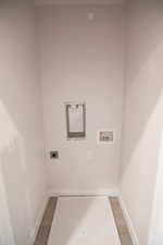 Laundry room featuring washer hookup and electric dryer hookup