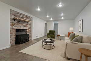Living room with baseboards and recessed lighting