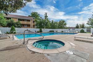 Community Pool with a Patio and Hot Tub