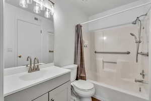 Full bath with shower / bathtub combination and vanity