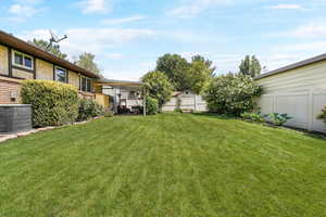 View of fenced backyard