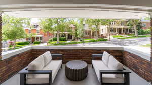 View of patio / terrace featuring an outdoor living space and a residential view