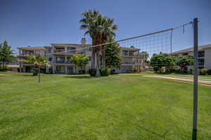 Surrounding community featuring a lawn