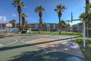 View of basketball court featuring community basketball court