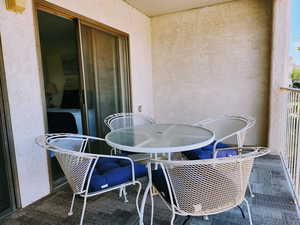 Balcony featuring outdoor dining space