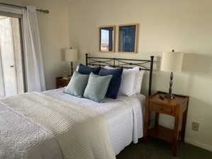 Bedroom with carpet flooring