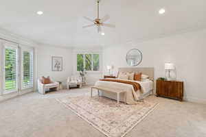 Carpeted bedroom with recessed lighting, access to exterior, ornamental molding, a ceiling fan, and vaulted ceiling
