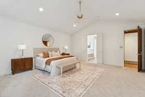 Bedroom featuring vaulted ceiling, light carpet, a ceiling fan, ornamental molding, and recessed lighting
