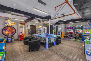 Recreation room with carpet flooring