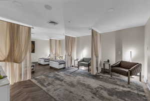 Sitting room featuring baseboards