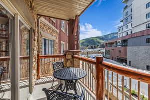 Balcony featuring a mountain view
