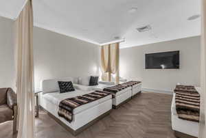 Bedroom featuring baseboards