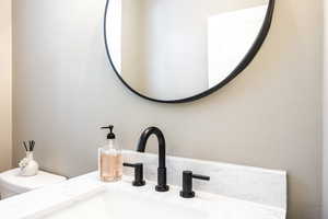 Bathroom view of toilet and vanity